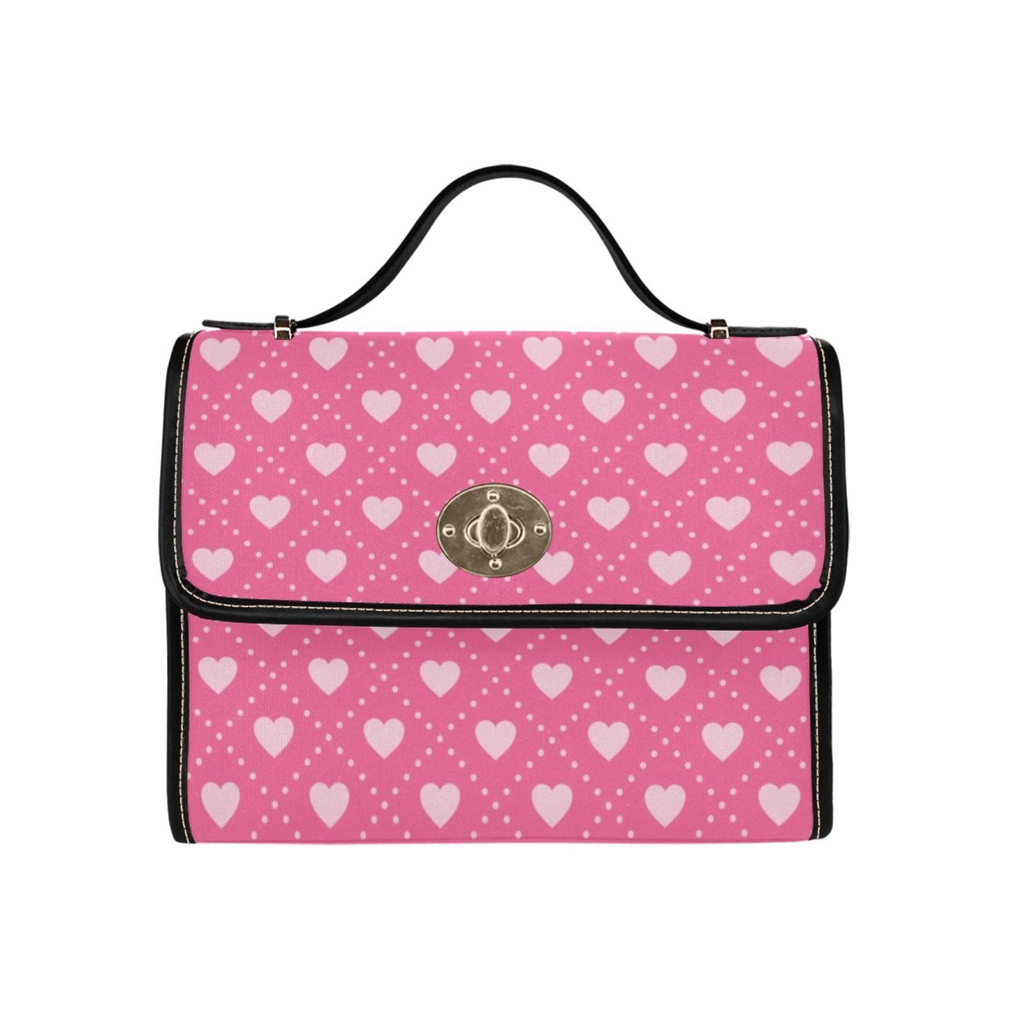 a pink and white purse with hearts on it